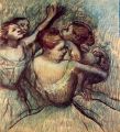 Four dancers in half figure