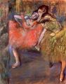 Two dancers behind the scenes