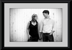 A light mat and dark frame complement black and white images