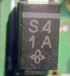 A tiny electronic part that was engraved with a laser
