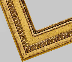 A gold-gilded picture frame from the time of Louis the 16th's reign in France 