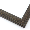 This slim, ornamented design features bevelled inner and outer edges and a celtic cross  pattern in relief.  The solid wood frame is covered in a deep brown, with a subtle gold patina that gives it an antiqued look.

1.25 " width: ideal for smaller artwork.  Photographs, paintings and giclee prints will shine within this detailed frame.