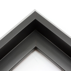 This unique floater frame for stretched canvas features a narrow, 0.5 " face that falls into a steep reverse slant toward the outer edge of the frame.  The modern style is finished in matte black.

Ideal for mounting medium to extra large, thick (1.5 " deep) gallery wrapped canvas portraits, paintings or Giclée prints. The canvas will extend slightly farther than the face of the frame. 

*Note: These solid wood, custom canvas floaters are for stretched canvas prints and paintings, and raised wood panels.