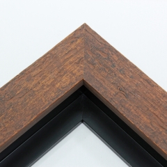 This simple but expressive floater frame features an organic wood grain face, complete with whorls and shallow ridges. The rich, matte walnut finish highlights the natural texture.

1.75" width: ideal for medium size artworks. The natural simplicity of this countryside frame is the perfect match for nature or farmland photographs or oil paintings.