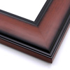 This wide frame features a smooth curve with bevelled inner and outer rims. The walnut wash has a wood grain detail, and fades to black at the edges.
3 " width: ideal for large and oversize artwork. Allow the rustic wood face to highlight a bucolic nature painting or photograph, or match the black edges to a contemporary print.