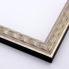 This simple, slim frame features a ridged, wave design with a beveled inner lip and smooth outer edge. A silver base is lightly antiqued with a black patina and burnishing. The outside drop edge is solid black.
1.25 " width: ideal for small to medium size images.