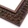 This ornate, intricate frame features a bold relief design in a matte, mottled gold and black. The raised, roughly textured inner lip is in a similar shade.
2.75 " width: ideal for large images. Select a strong piece of artwork to avoid having it overpowered by this decadent frame.