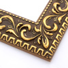 A large, reverse curve profile frame with an intricate leaf design bordered by a geometric outer edge and beaded inner lip. A dark, matte gold-brown base with gold foil patina for added depth on the topmost points of the design. Strong, solid wood construction.
2.75 " witdth: ideal for large and oversize (extra large) images.