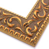 A large, reverse curve profile frame with an intricate leaf design bordered by a geometric outer edge and beaded inner lip. A matte and gold foil base features bronze patina for added depth on the topmost points of the design. Strong, solid wood construction.
2.75 " width: ideal for large and extra large images.