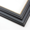 This stepped, reverse scoop frame with raised outer edge features a blue-grey wash that highlights the natural wood grain. The recesses of the profile are a whiter shade, and cracked gold foil adorns the inner lip.
1.75 " width: ideal for medium size images. A wide variety of photographs, paintings and prints will be enhanced within this unique frame.