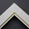 Linen liners are a great option for providing blank space between art and frame. Where glass is generally required to protect paper artworks and their mat, a linen liner does not require glass, making it ideal for paintings and Giclée prints.
This 1.25 inch natural liner has an authentic linen texture and colour, and a gold and painted white lip. It is best suited to medium size canvas prints, watercolour or oil paintings.