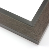 This unique frame with a raw wood face features long edge grain texture and a deep brown wash. The frame forms a shallow V, with the matte black inner lip sloping out and then rising again (see illustration). The outer drop edge is also matte black.
2 " width: ideal for medium size artwork. The modern style of this frame makes it a great match to more contemporary paintings and photography.