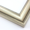This high fashion, solid wood frame features a dramatic scoop profile and high outer edge (1.25” depth), all wrapped in ornate silver foil. A black patina applied to the top-most ridges give it a subtle, distressed appearance that adds to its vintage elegance.
2 " width: ideal for medium- or large-size images. Border an old family photograph, favourite painting, or Giclée print in this quality frame.