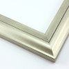 This high shine, silver foil wood frame features an elegant curve-and-scoop profile that draws the eye inward. Slight distressing on the inner lip, and dark grey along the stepped ridge add a subtle antique finish.
1.75 " width: suitable for both medium and large images. A striking border for a black and white photograph, or to highlight a classic painting or Giclée print.