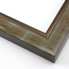 This steeply curved wood frame features a walnut wash brushed with cream-colour crosshatching. The natural wood grain is evident throughout, and the inner lip is defined with muted bronze foil.
1.75 " width: ideal for medium images. This highly versatile frame will suit a wide selection of photographs, paintings or giclee prints.