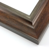 This elegant frame has a double scoop profile. The outer, wider scoop brings out the natural wood in a deep golden brown. The inner lip features a subtle silver foil finish that maintains the wood grain.
2.5 " width: ideal for large and extra large images. Border a bold watercolour or oil painting, or your favourite Giclée print, in this stylish, classic frame.