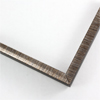 This 1/2 " frame features a scooped profile from a flat outer edge. Along with brown finish and delicate sliver detailing creating horizontal lines across the scooped profile. The colors fade to create a seamless blend. The sides of the frame features a matte black finish.
1/2 " width: ideal for small artwork. This modern frame is suitable for a wide variety of art mediums, from photographs to paintings and giclee prints.