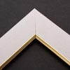 Linen liners are a great option for providing white space between art and frame. Where glass is generally required to protect paper artwork and its mat, a linen liner does not require glass, making it perfect for paintings and Giclée prints.
This 2 inch white liner has an authentic linen texture and a bevelled gold lip. It is ideal for small, medium or large canvas prints, watercolours or oil paintings.