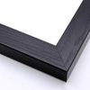 This heavy frame features simple, straight edges and a glossy black finish with wood grain details.
Protruding 1.25 "es, a distinct division is achieved between art and wall. The deep rabbet also provides shadow box properties.
1.5 " width: ideal for medium size images. The simple, classic nature of this frame, and it