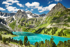 A stunning mountain shot with a clear, blue lake